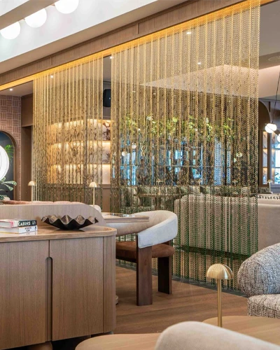 Anodized chain link curtain used in reception room