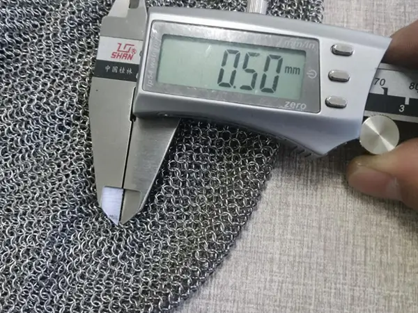 Measure the  chainmail curtain wire diameter with a caliper.