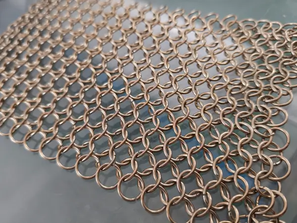 Detail display of rose gold chainmail curtain