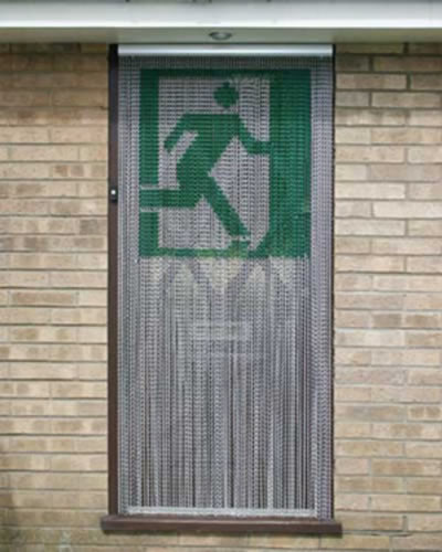 A chain link window fly screen with a road design